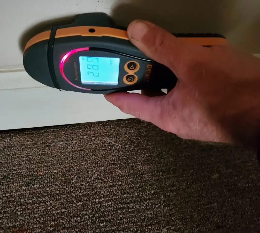 Moisture detection at baseboard during Storm Damage Restoration in Countryside